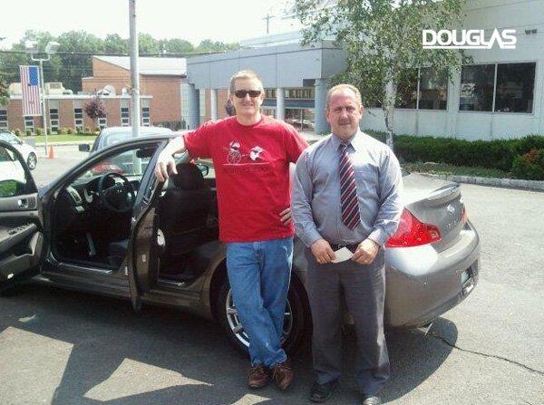 William Brennan picking up his 2011 G37X from Mike Carchia.